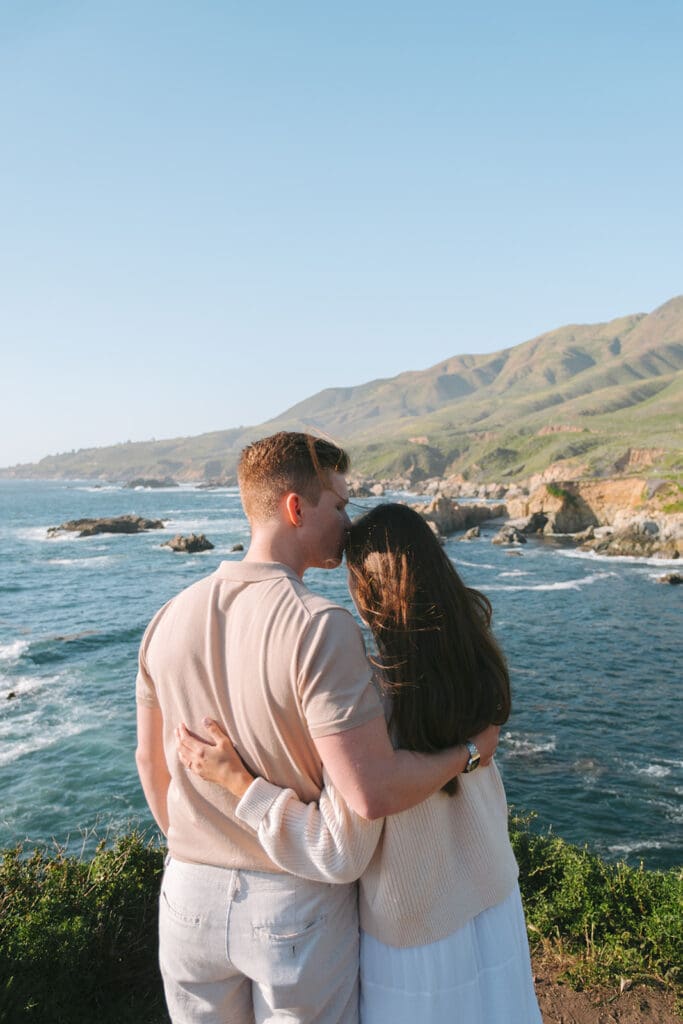 Couple at cliff and beach in one Big Sur photo session